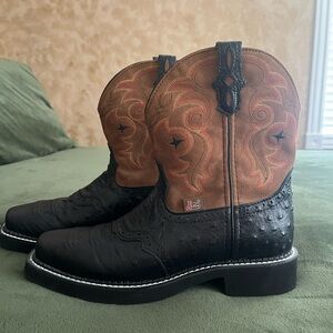Women’s black and brown cowboy boots. Very good condition. Not worn much.